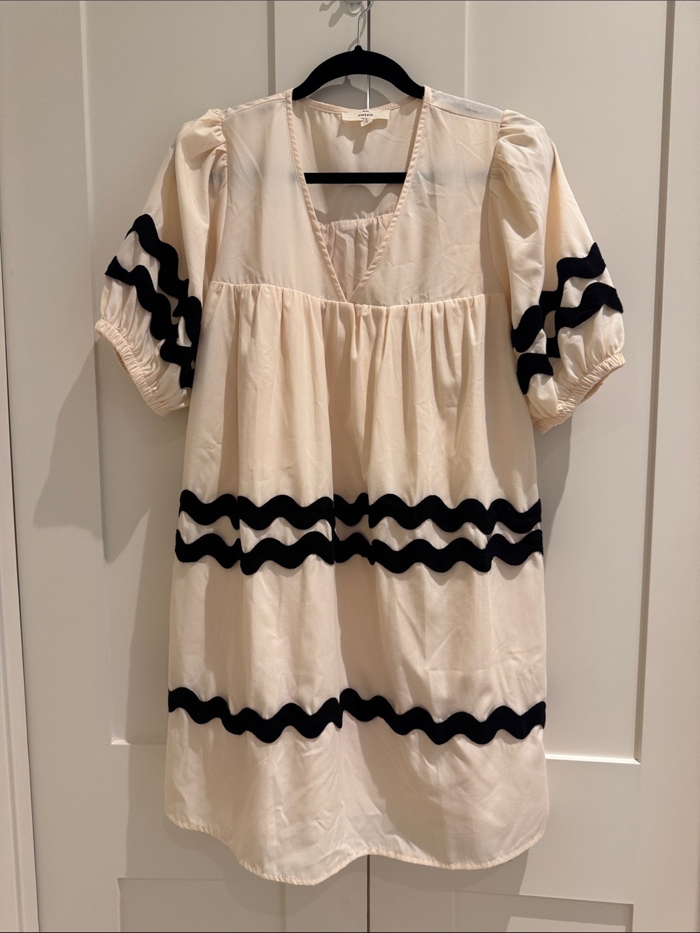 entro Cream Dress with Black Wave Trim and Lined with Pockets